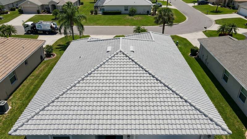 Example of roof cleaning in Largo, FL — after soft washing. Shingle - lichen + moss on north-facing slope. Warranty preserved.